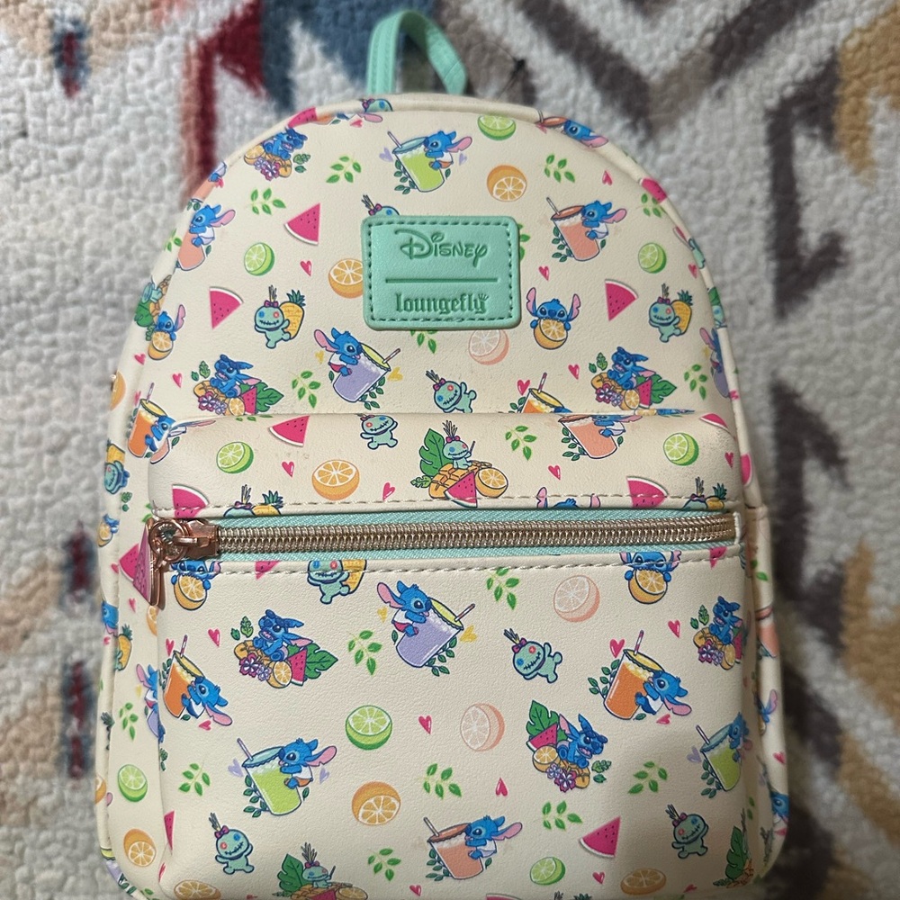 Loungefly Cream Backpack with Colorful Stitch Pattern